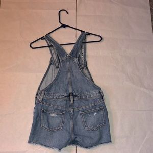 A Short ripped Jean romper🤍👖